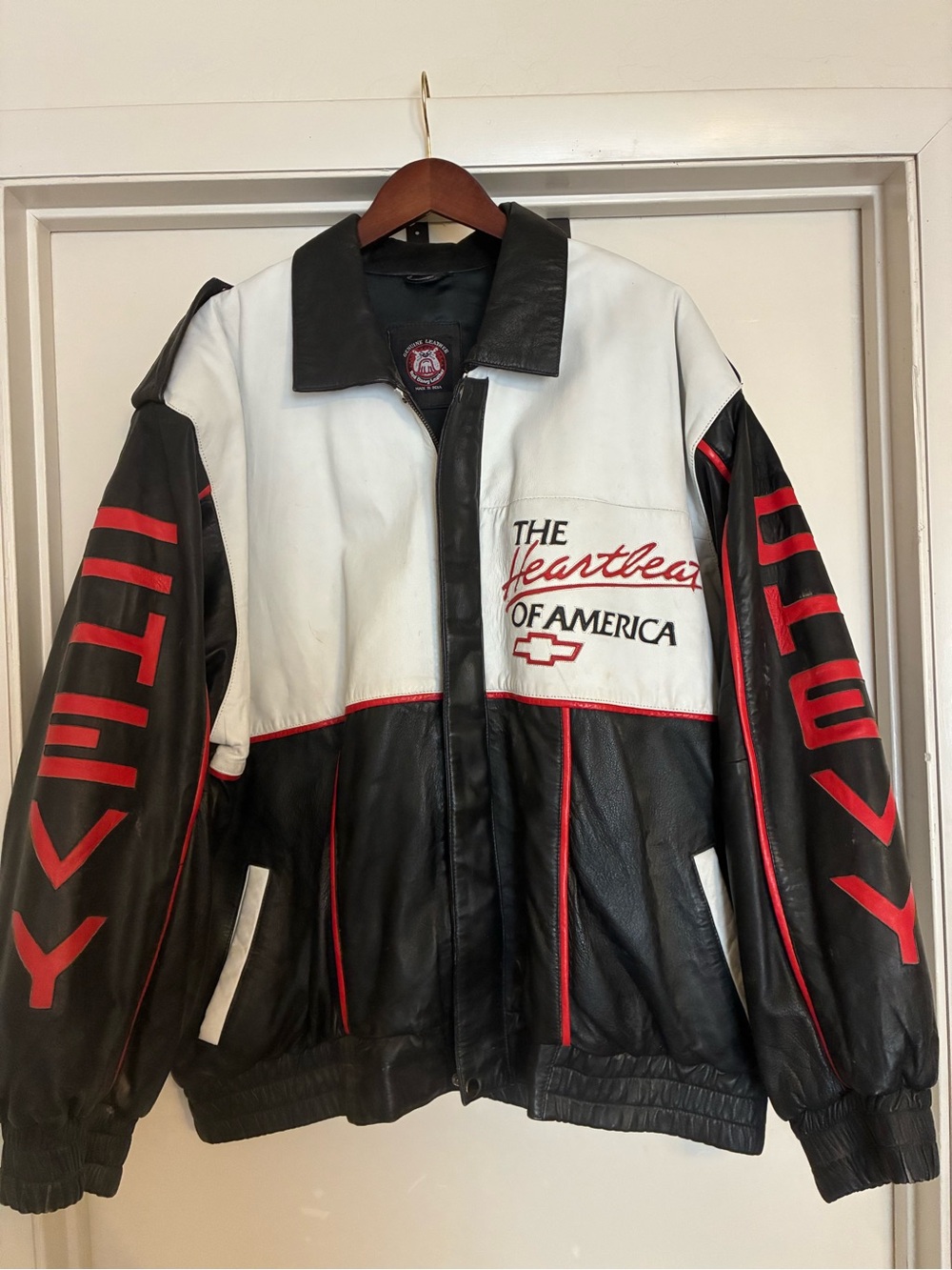 Black & White Leather Bomber Jacket with Red Accents